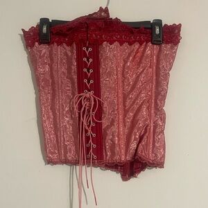 Pink corset top with lace up back size M